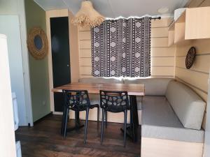 Campings CAMPING & SPA CAP SOLEIL : photos des chambres