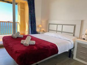 Sunrise Beachfront Apartment by the Marina