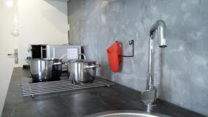 Appartements Gites de l'isle Centre-Ville - WiFi Fibre - Netflix, Disney, Amazon - Sejours Pro : photos des chambres