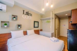 Modern and Compact Studio at Patraland Urbano Apartment By Travelio