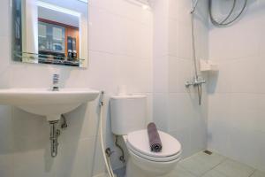 Modern and Compact Studio at Patraland Urbano Apartment By Travelio