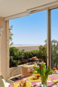 Appartements Arcadia Appartement - Vue sur Mer : photos des chambres