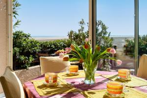 Appartements Arcadia Appartement - Vue sur Mer : photos des chambres