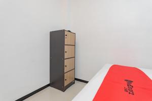 RedDoorz Syariah At Afifah Guest House near Bikasoga Sport Center