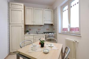 GuestHost - Accogliente Appartamento vicino al Centro Storico con Posto Auto