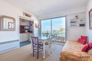 Appartements Studio les pieds dans l'eau bord de mer : photos des chambres