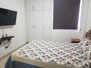 Elegante apartamento discreto, con playa y piscina