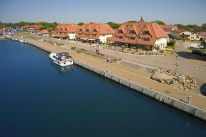 hafennahe Ferienwohnung mit Balkon und Meerblick - Hafenhäuser Wiek FeWo Wohnung 04