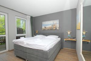 strandnah mit Terrasse, gratis Nutzung vom AHOI Erlebnisbad und Sauna in Sellin - Strandhaus Mönchgut FeWo09