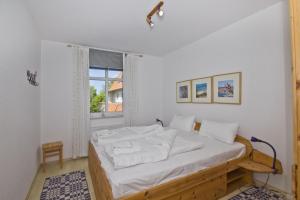 Hafenhäuser Breege FeWo 14 - Balkon, etwas Meerblick