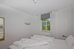 Hafenhäuser Breege FeWo 14 - Balkon, etwas Meerblick