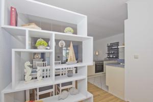 Ferienwohnung mit Balkon, gratis Nutzung vom AHOI Erlebnisbad und Sauna in Sellin - Haus Strandeck FeWo 19