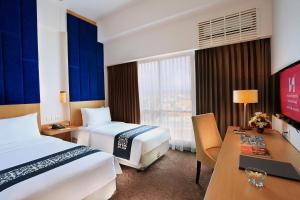 Phòng Hai Giường Đơn Loại Sang (Deluxe Twin Room)