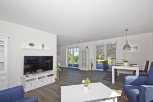 gemütliche Ferienwohnung mit Terrasse und Garten - Ferienhaus Zaunkönig FeWo EG