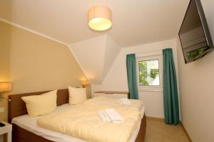 strandnahe FeWo mit Balkon, gratis Nutzung vom AHOI Erlebnisbad und Sauna in Sellin - Rex Rugia FeWo 11-5