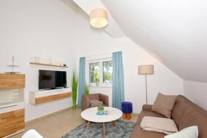 Strandresort Rex Rugia Ferienwohnung 10-8 mit Sauna- und Schwimmbadnutzung im AHOI Sellin