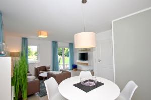 strandnahe FeWo mit Terrasse, gratis Nutzung vom AHOI Erlebnisbad und Sauna in Sellin - Rex Rugia FeWo 11-3