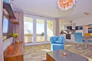 mit Meerblick und Terrasse, gratis Nutzung vom AHOI Erlebnisbad und Sauna in Sellin - Meeresblick FeWo 62