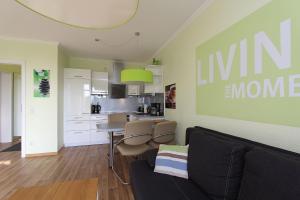 Terrasse, gratis Nutzung vom AHOI Erlebnisbad und Sauna in Sellin - Meeresblick FeWo 31