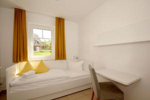 strandnahe FeWo mit Terrasse, gratis Nutzung vom AHOI Erlebnisbad und Sauna in Sellin - Rex Rugia FeWo 28-3