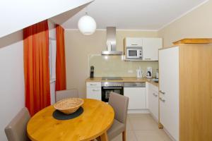 strandnahe FeWo mit Balkon, gratis Nutzung vom AHOI Erlebnisbad und Sauna in Sellin - Rex Rugia FeWo 29-8