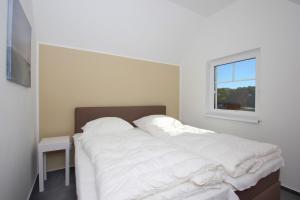 strandnahe FeWo mit Balkon, gratis Nutzung vom AHOI Erlebnisbad und Sauna in Sellin - Rex Rugia FeWo 13-7