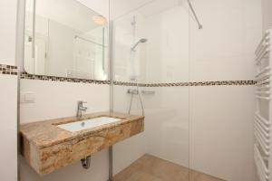 strandnahe FeWo mit Terrasse, gratis Nutzung vom AHOI Erlebnisbad und Sauna in Sellin - Rex Rugia FeWo 13-4