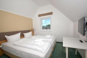 strandnahe FeWo mit Balkon, gratis Nutzung vom AHOI Erlebnisbad und Sauna in Sellin - Rex Rugia FeWo 14-7