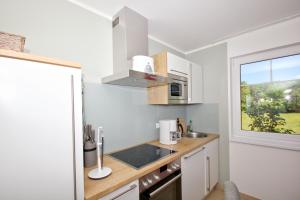 strandnahe FeWo mit Terrasse, gratis Nutzung vom AHOI Erlebnisbad und Sauna in Sellin - Rex Rugia FeWo 14-3