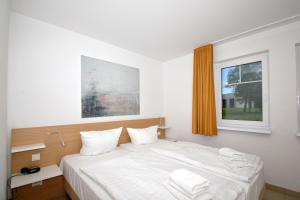 strandnahe FeWo mit Terrasse, gratis Nutzung vom AHOI Erlebnisbad und Sauna in Sellin - Rex Rugia FeWo 30-4