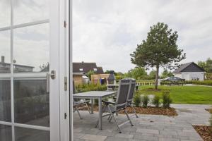 moderne Ferienwohnung mit eigener Terrasse - Haus Inselwind FeWo MEERglück