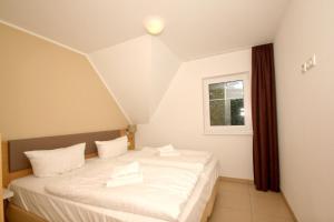 strandnahe FeWo mit Balkon, gratis Nutzung vom AHOI Erlebnisbad und Sauna in Sellin - Rex Rugia FeWo 14-5