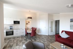 mit Meerblick und Balkon, gratis Nutzung vom AHOI Erlebnisbad und Sauna in Sellin - Meeresblick FeWo 66