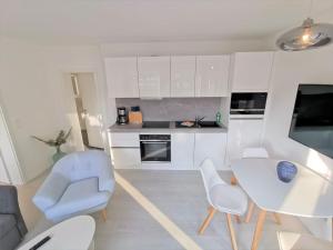 moderne Ferienwohnung mit eigener Terrasse - Haus Inselwind FeWo MEERhafen