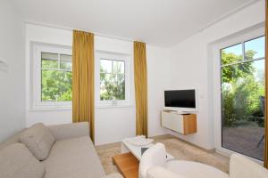 strandnahe FeWo mit Terrasse, gratis Nutzung vom AHOI Erlebnisbad und Sauna in Sellin - Rex Rugia FeWo 28-4