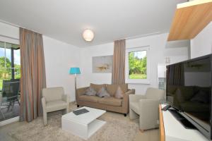 strandnahe FeWo mit Terrasse, gratis Nutzung vom AHOI Erlebnisbad und Sauna in Sellin - Rex Rugia FeWo 30-1