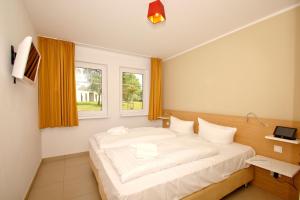 strandnahe FeWo mit Terrasse, gratis Nutzung vom AHOI Erlebnisbad und Sauna in Sellin - Rex Rugia FeWo 30-1