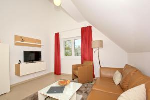 strandnahe FeWo mit Balkon, gratis Nutzung vom AHOI Erlebnisbad und Sauna in Sellin - Rex Rugia FeWo 14-8