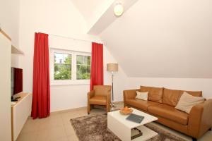 strandnahe FeWo mit Balkon, gratis Nutzung vom AHOI Erlebnisbad und Sauna in Sellin - Rex Rugia FeWo 14-8