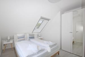 Ferienwohnung mit Balkon und Gartennutzung - Haus Inselwind FeWo MEERurlaub