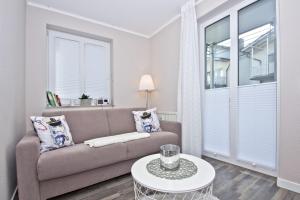 zentrale FeWo mit Balkon, gratis Nutzung vom AHOI Erlebnisbad und Sauna in Sellin - Villa Buskam FeWo 22