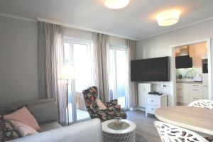 zentrale FeWo mit Balkon, gratis Nutzung vom AHOI Erlebnisbad und Sauna in Sellin - Villa Buskam FeWo 28