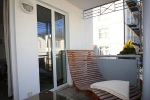 zentrale FeWo mit Balkon, gratis Nutzung vom AHOI Erlebnisbad und Sauna in Sellin - Villa Buskam FeWo 28