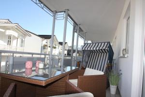 zentrale FeWo mit Balkon, gratis Nutzung vom AHOI Erlebnisbad und Sauna in Sellin - Villa Buskam FeWo 28