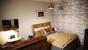 Appartements La Tannerie - BedinShop : photos des chambres