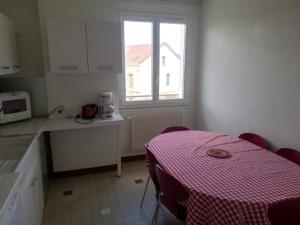 Appartements La Fontaine, F2 au coeur de Paray : photos des chambres