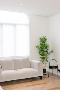 Boonuz guesthouse, luxe duplex vakantiehuis in centrum Ieper met privé lounge terras en IR sauna