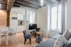 Appartements Au Bourg Neuf : photos des chambres