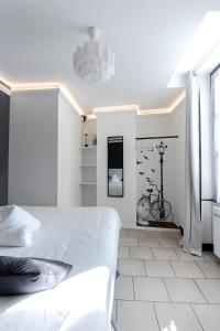 Appartements Au Bourg Neuf : photos des chambres