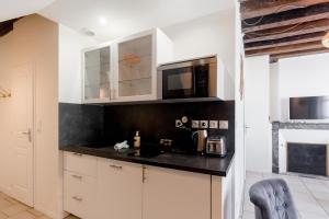 Appartements Au Bourg Neuf : photos des chambres